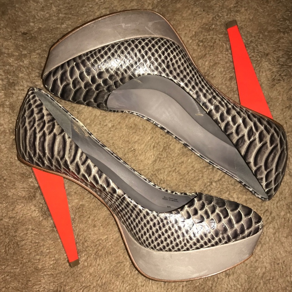 BCBG Max Azria snakeskin pump with orange heel